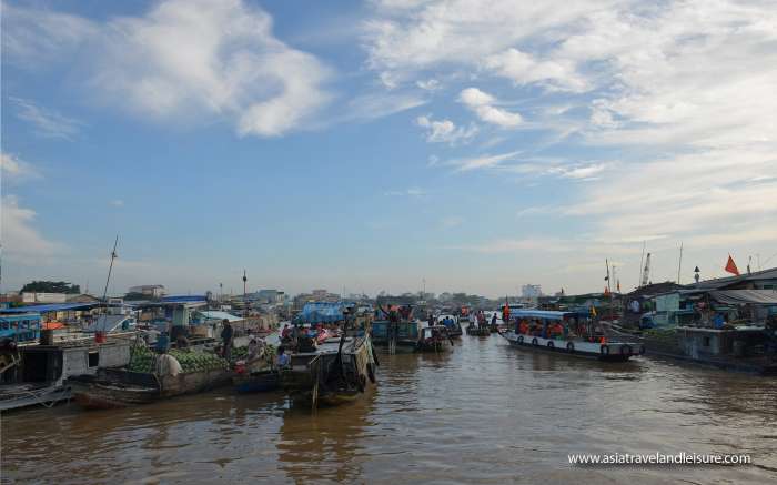 An early morning at busy floating market 