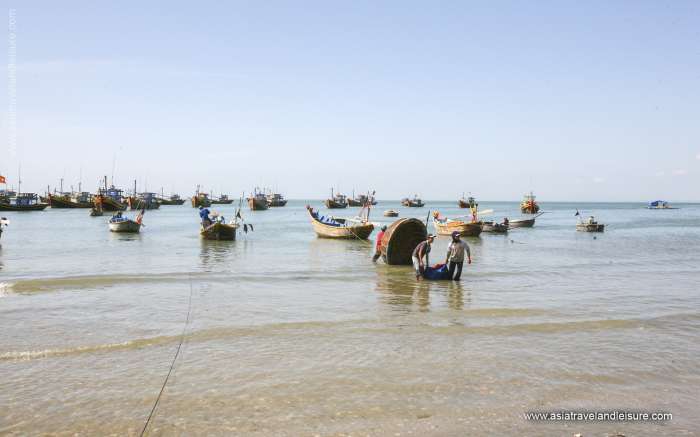 Fishing boats parked on the beach