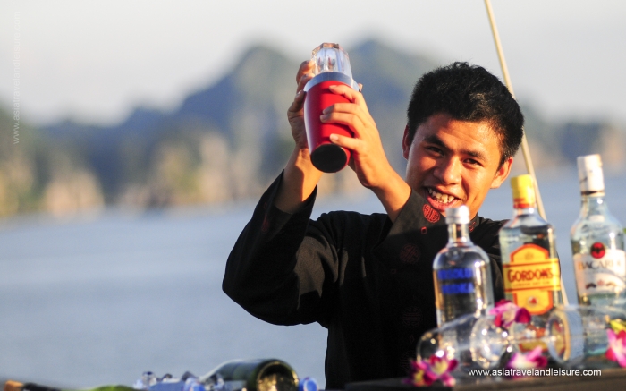 Happy bartender on Halong bay cruise 