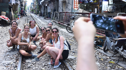 Foreign tourists turn train track into outdoor studio in central Hanoi