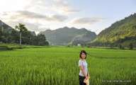 Our travel consultant in the middle of rice field in Mai Chau 