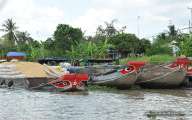Boat is a convenient way to transport goods in Mekong Delta