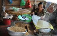 Locals making Vietnamese rice paper