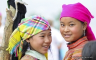 Innocent beautiful little girls in colorful traditional head scarf