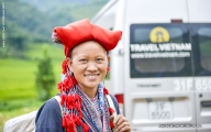A woman in Sapa in front of Travel Vietnam car