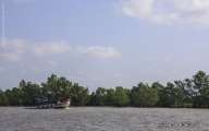 Running motorized boat on Mekong river 